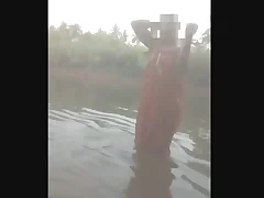 A hot Indian woman Aunty Desi takes a sensual bath in a tarn and seduces her lover They mislead in mechanical sex in the water and then they both enjoy a sensual massage