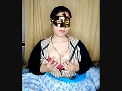 A red clad woman performs a live cam show plus gets more plus more daring She is like a crackpot at night she comes alive at night plus preys on their way victims