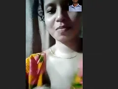 An Indian girl exposes the brush breasts primarily membrane chat
