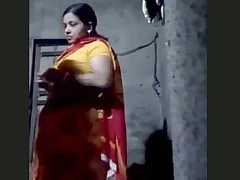 Desi bhabi shows off her big boobs while acquiring fucked