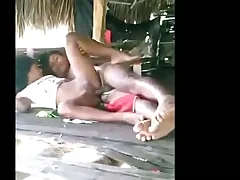 Amateur couple enjoys outdoor sex in a tent house aloft the beach